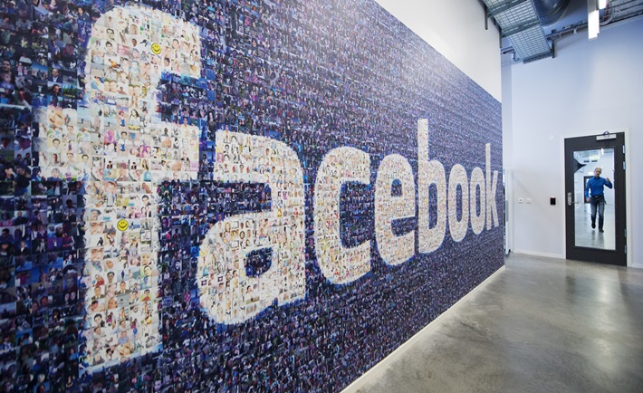 A big logo created from pictures of Facebook users worldwide is pictured in the company's Data Center, its first outside the US on November 7, 2013 in Lulea, in Swedish Lapland. The company began construction on the facility in October 2011 and went live on June 12, 2013 and are 100% run on hydro power. AFP PHOTO/JONATHAN NACKSTRAND (Photo credit should read JONATHAN NACKSTRAND/AFP/Getty Images)